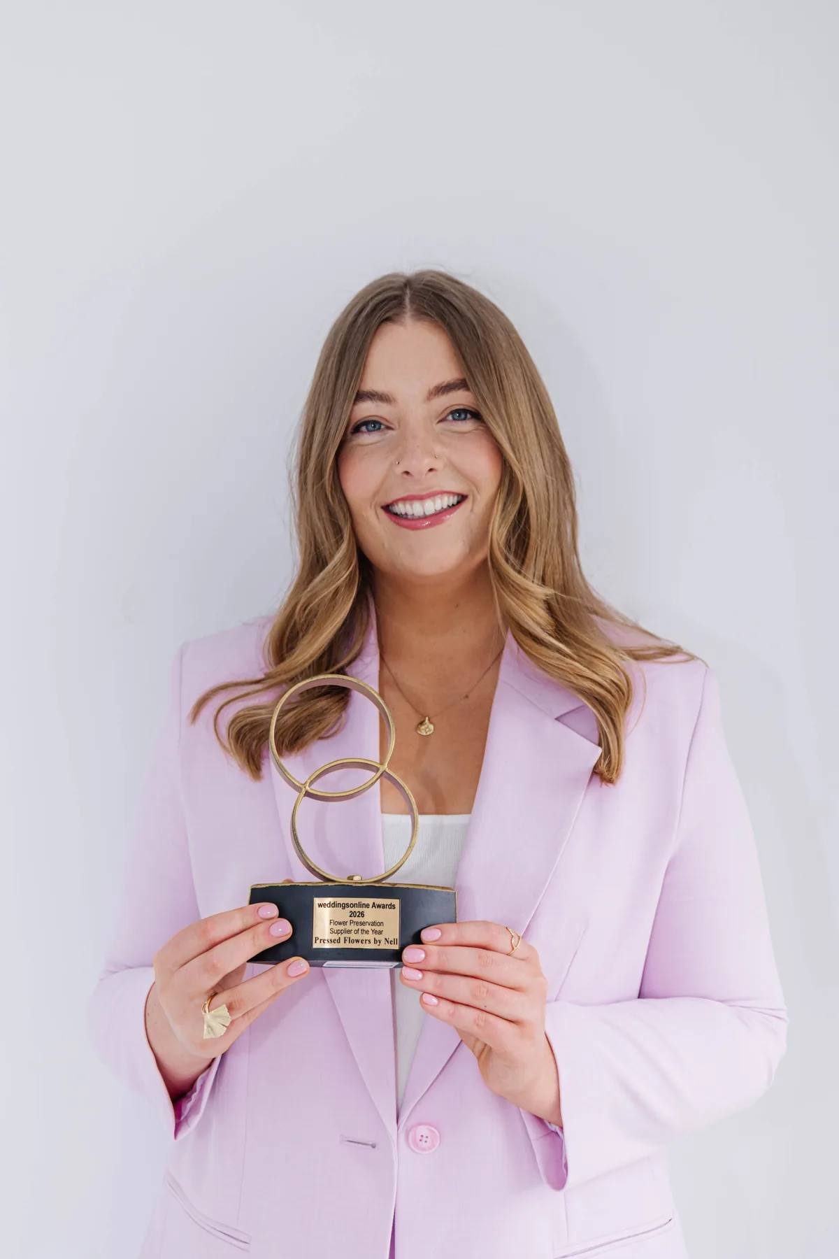 Nell with the weddingsonline Awards 2026 trophy