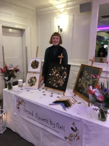 A Pressed Flowers by Nell stand at a wedding fair