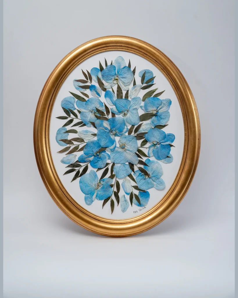 The same bouquet pressed and framed by Nell