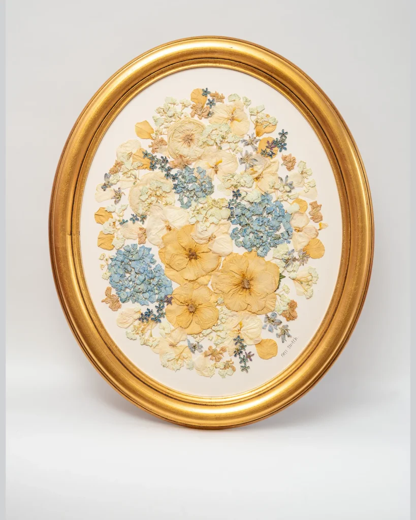The same bouquet pressed and framed by Nell