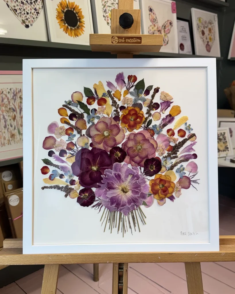 The same bouquet pressed and framed by Nell