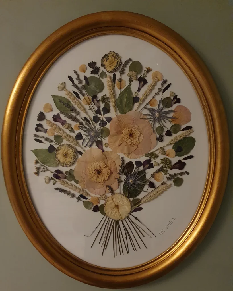 The same bouquet pressed and framed by Nell