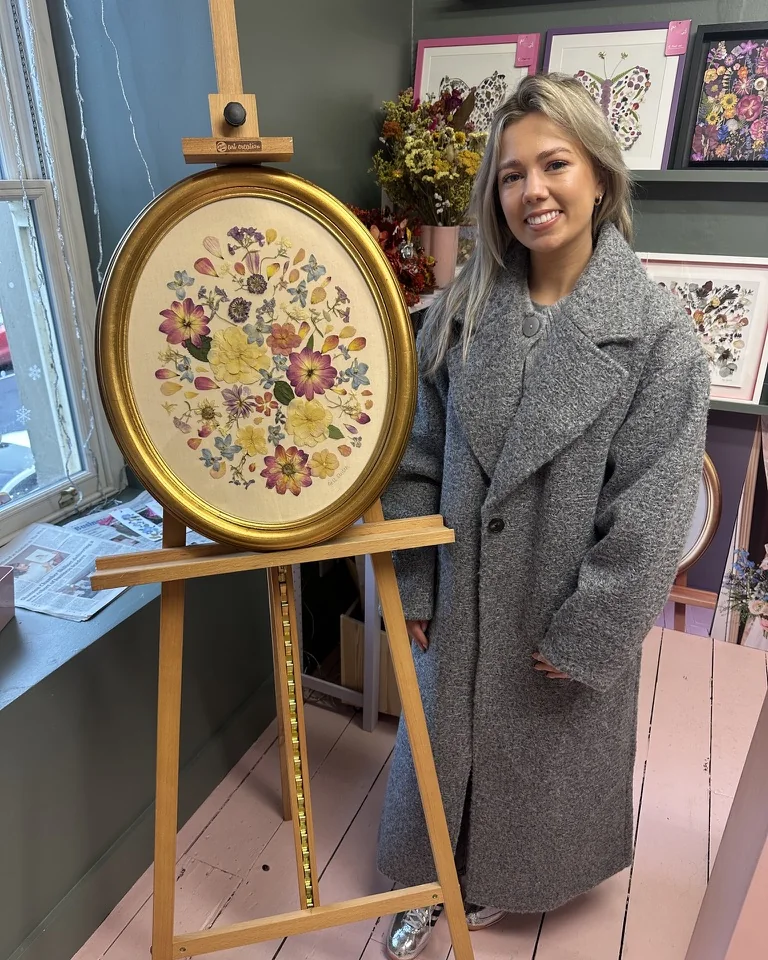 The same bouquet pressed and framed by Nell