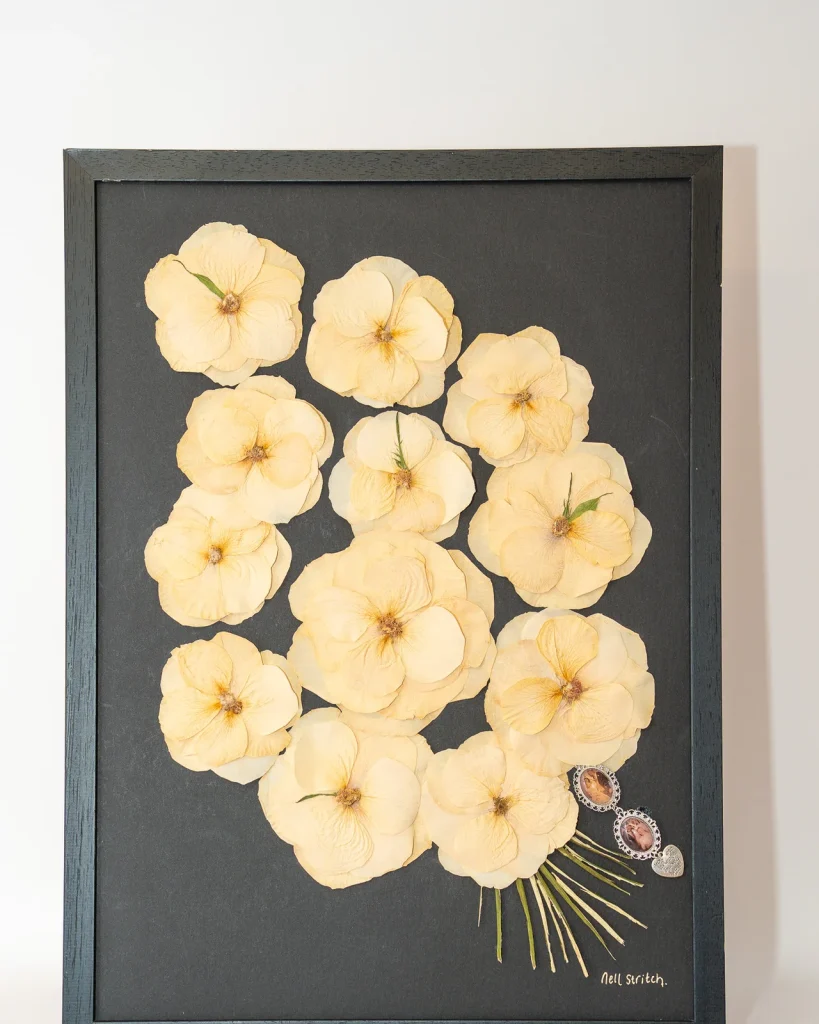 The same bouquet pressed and framed by Nell
