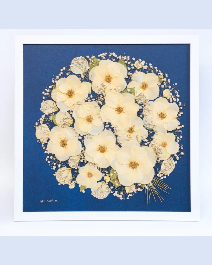 The same bouquet pressed and framed by Nell