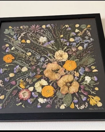 The same bouquet pressed and framed by Nell