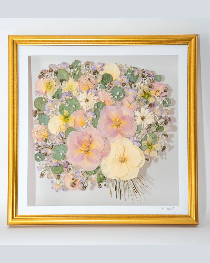 The same bouquet pressed and framed by Nell