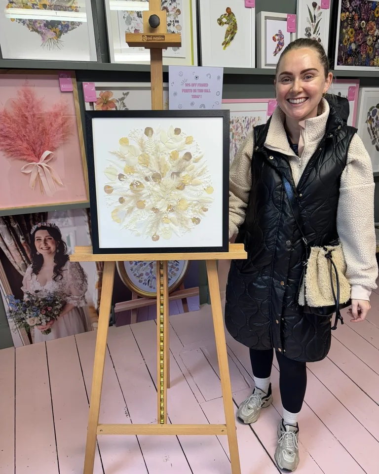 The same bouquet pressed and framed by Nell