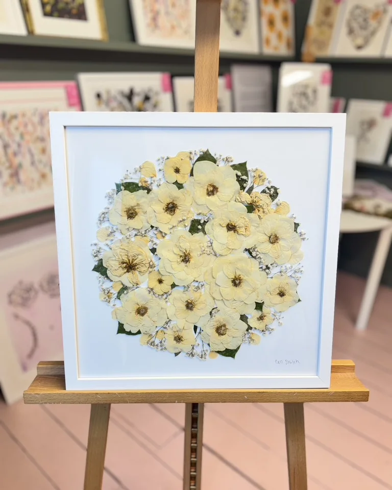 The same bouquet pressed and framed by Nell