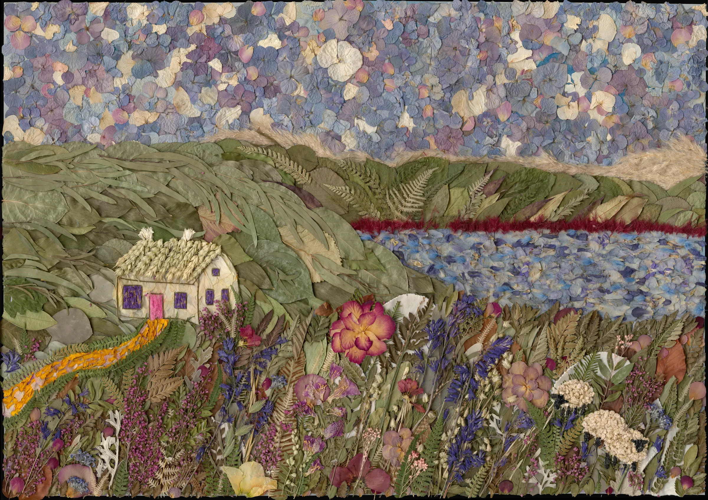 A pressed flower landscape of a cottage by a lake