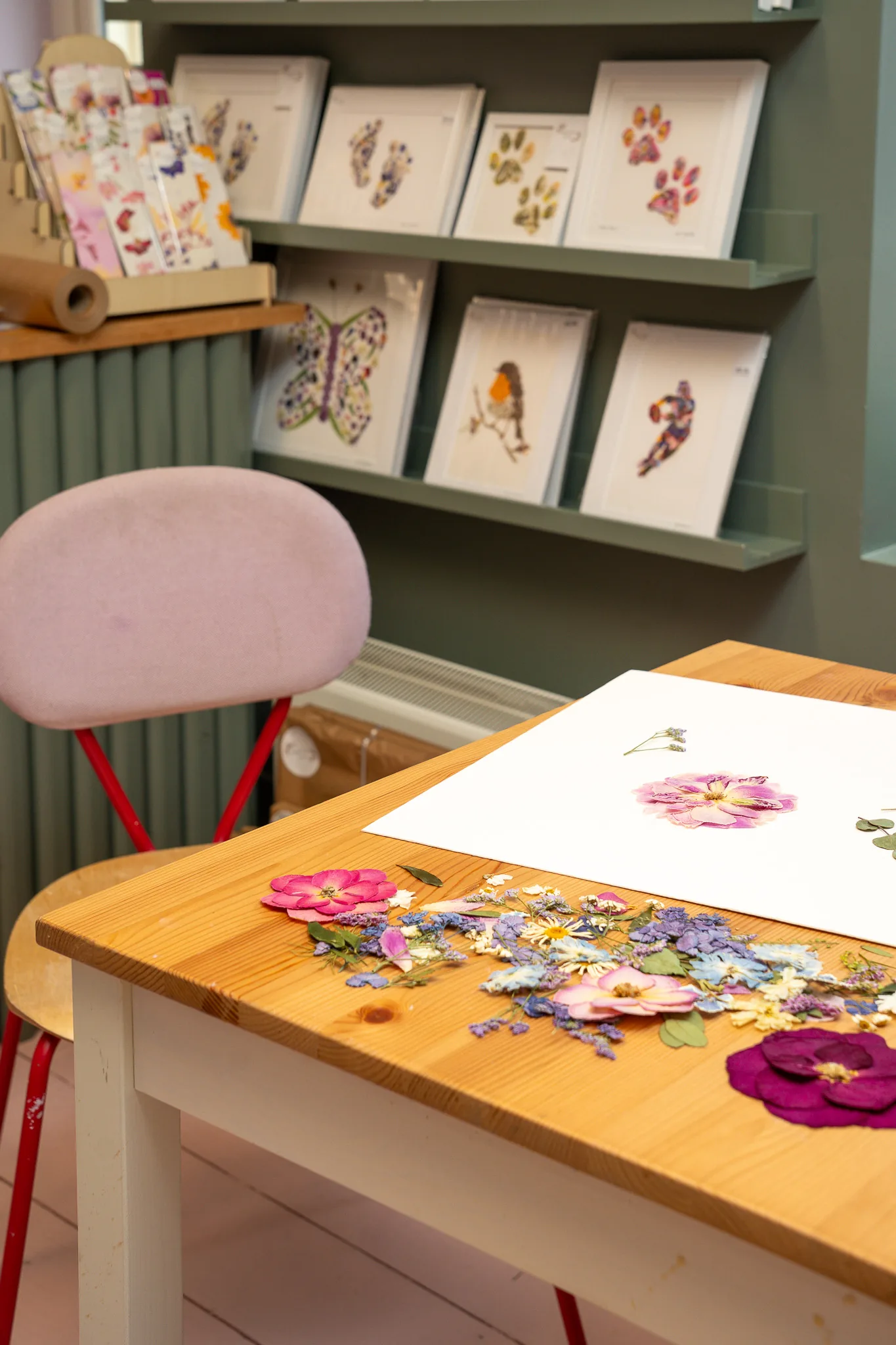 Nell’s studio table with a pressed flower design in progress