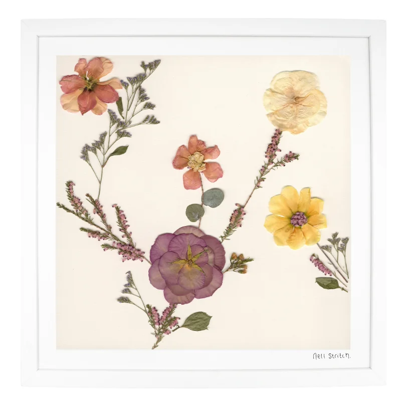 Dancing Flowers, pressed flower art in a white frame