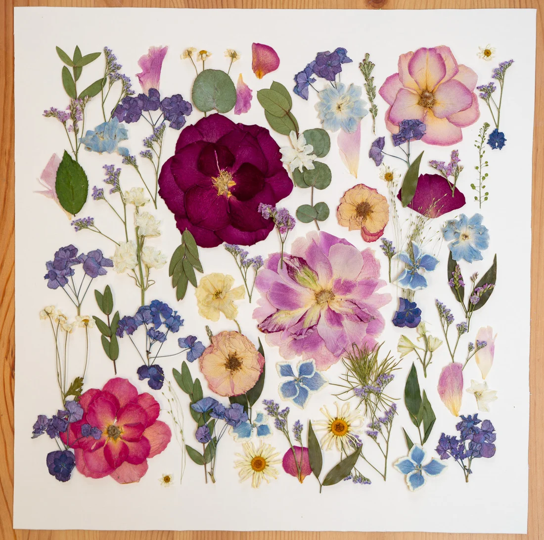 Meadow Romance, square design on a wooden table