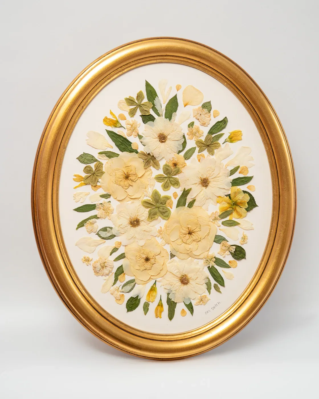 Oval pressed bouquet, 19 x 23 inch
