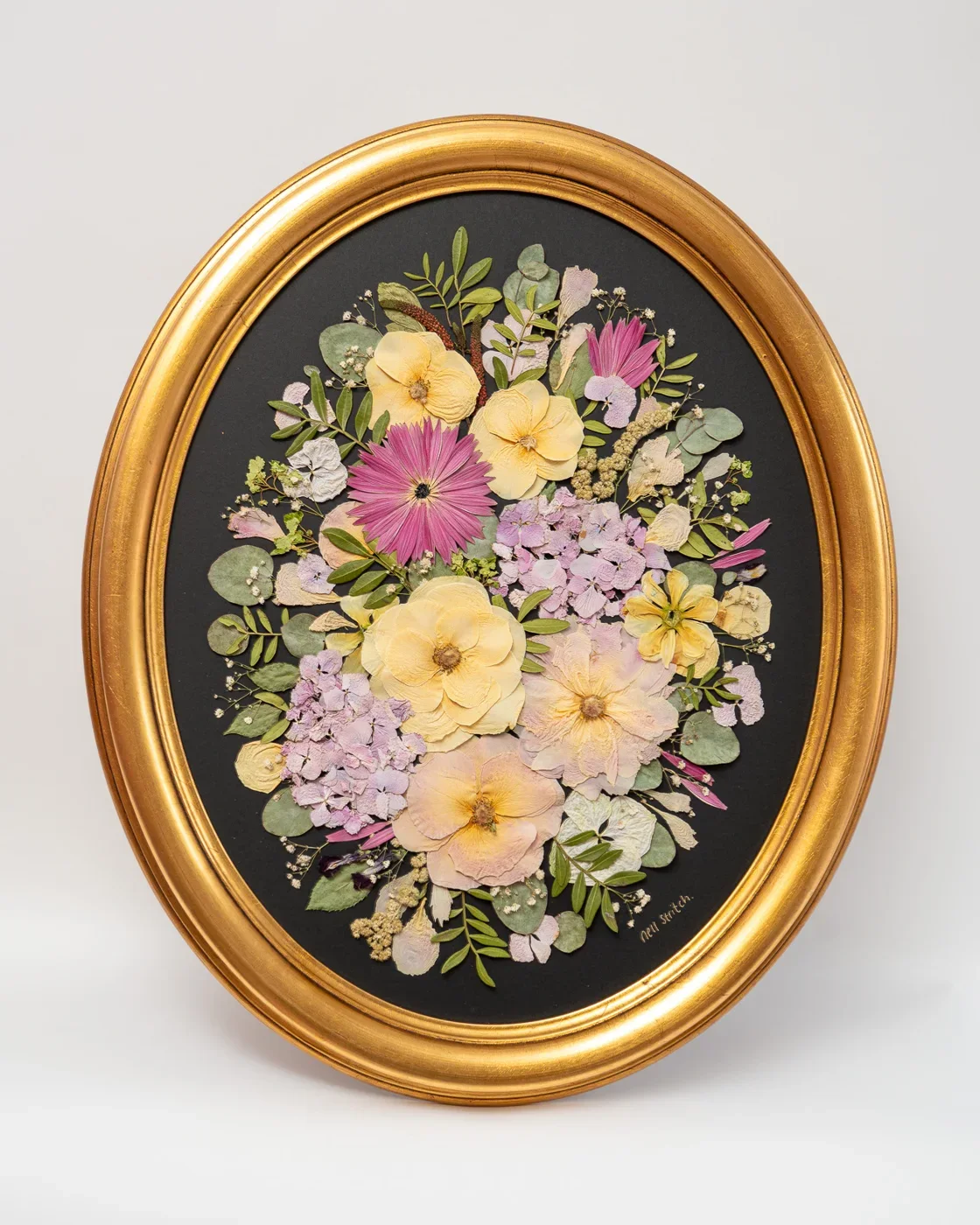Oval pressed bouquet, 19 x 23 inch