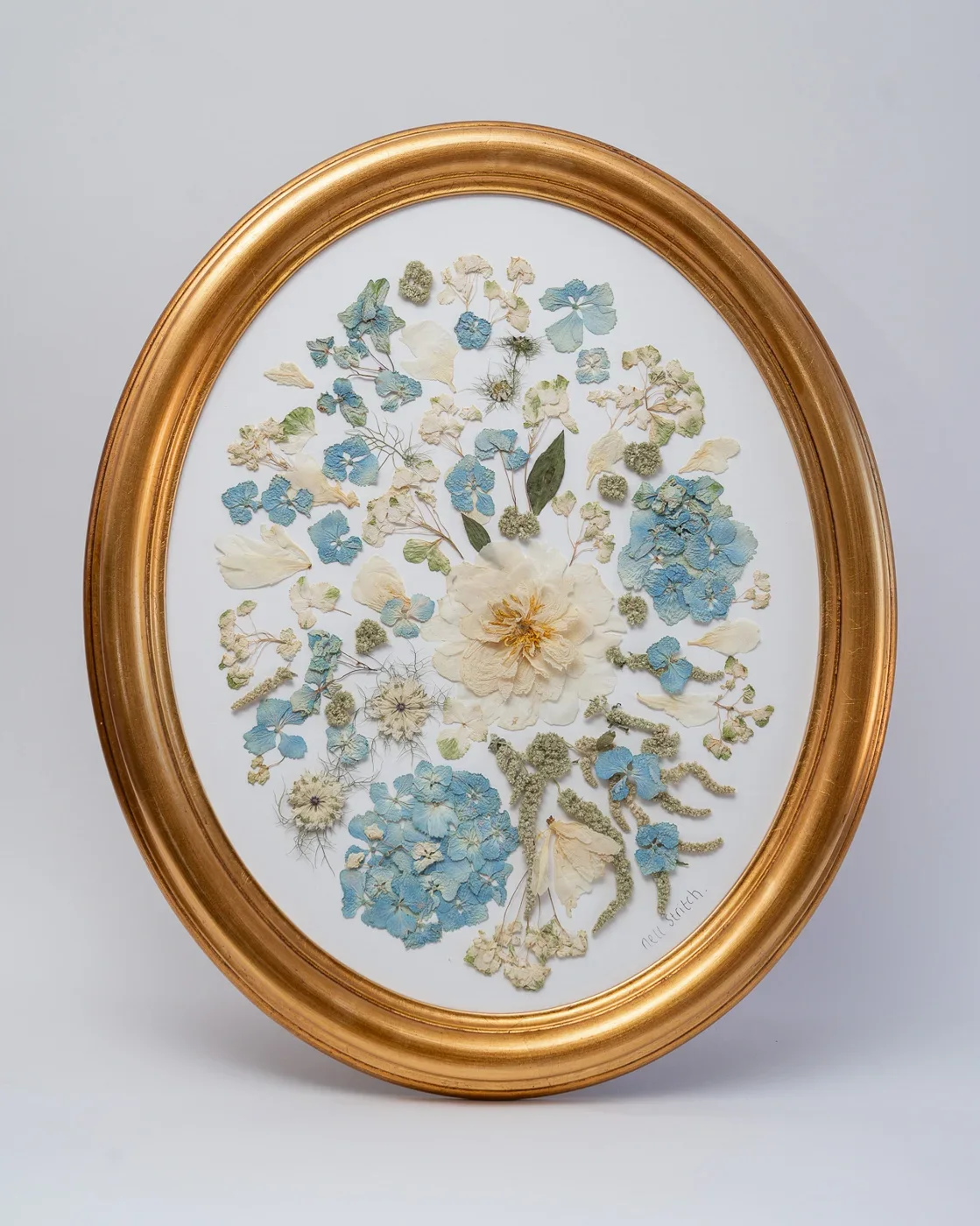 Oval pressed bouquet, 19 x 23 inch